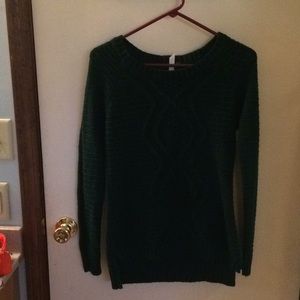 Dark green sweater with criss-cross knit design